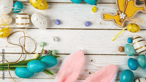 Valokuva easter holiday card with basket, decorated easter eggs and easter's knick knack