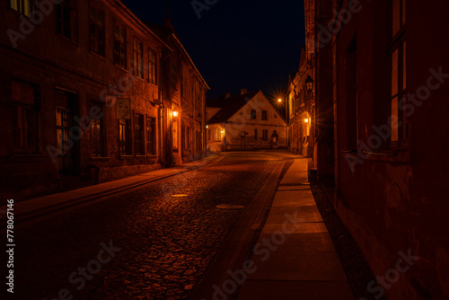 Latvia. Kuldiga. Old town street in the night.
