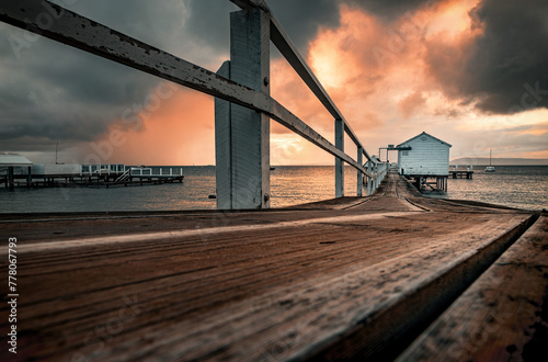 The low-angle view of a pier in Millionaire's Walk in Mornington Peninsula at dawn