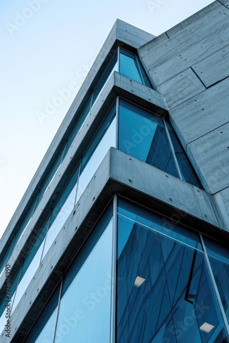 Contemporary triangle shape design modern Architecture building exterior with glass, concrete and steel element