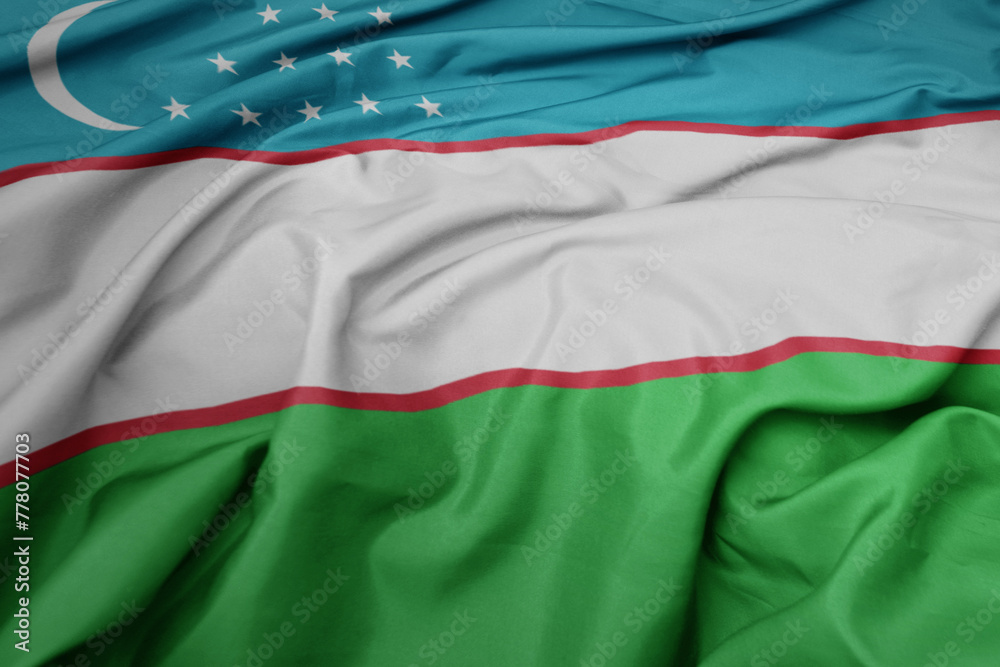 waving colorful national flag of uzbekistan.