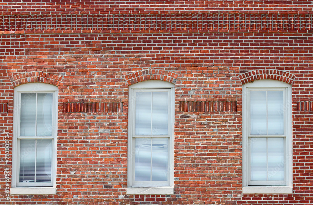 Old Brick Building with White Window Frames and Blinds in Downtown Indianapolis, IN, USA Old Brick Building with White Window Frames and Blinds in Downtown Indianapolis, IN, USA