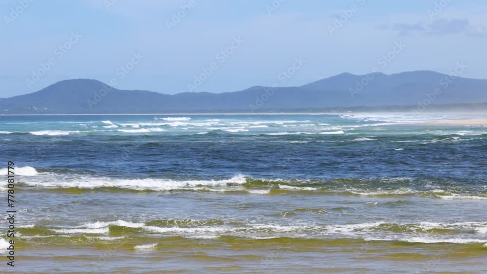 Serene Beach and Distant Mountains Serene Beach and Distant Mountains