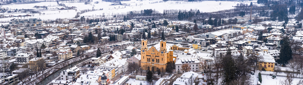 Fototapeta premium Wide panoramic aerial view of Brunico (Bruneck), South Tyrol, Italy in the winter.