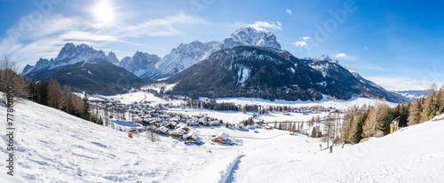 Wide panoramic view of winter landscape with snow covered Dolomites in Kronplatz, Italy