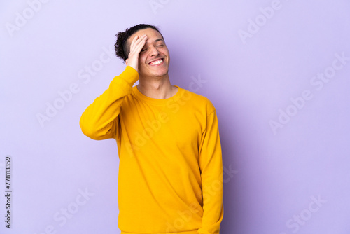 Caucasian man over isolated background smiling a lot © luismolinero