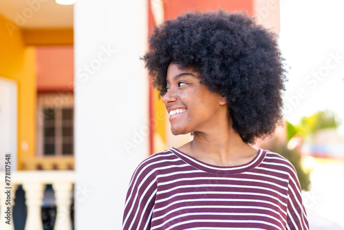 African American girl at outdoors with happy expression