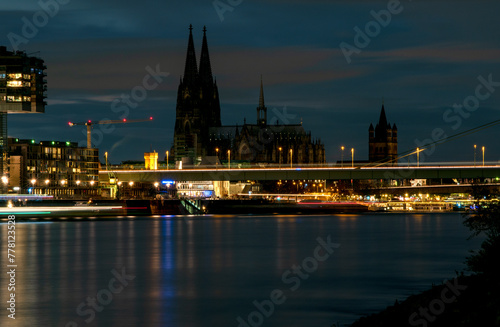 Night view on the banks of Rhine river in Cologne  Germany