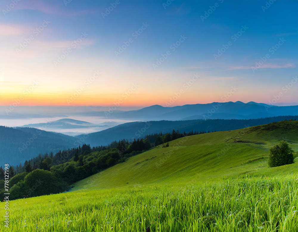 Beautiful landscape with green grass and hills in the morning