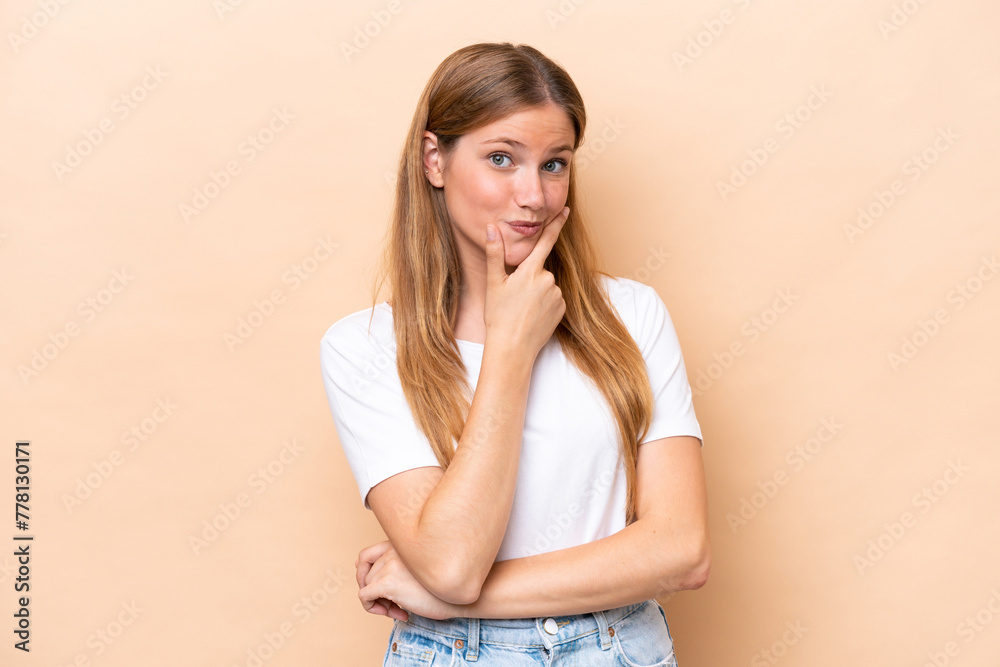 Young caucasian woman isolated on beige background happy and smiling Young caucasian woman isolated on beige background happy and smiling
