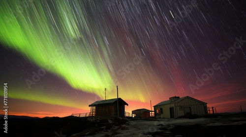 Mesmerizing aurora borealis illuminating the night sky above a charming house