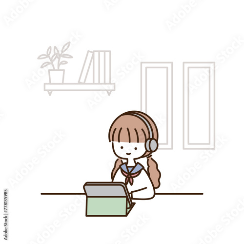 タブレットPCとヘッドフォンを使って動画を視聴する女子高生