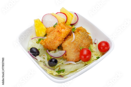 Fried fish with salad in a bowl isolated on a white background