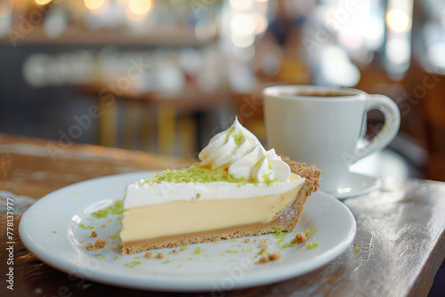 Key lime pie in a cozy cafe setting  served with a cup of coffee  inviting and homely ambiance  soft focus on the dessert