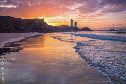 Minou lighthouse against the backdrop of sunrise in Finistere