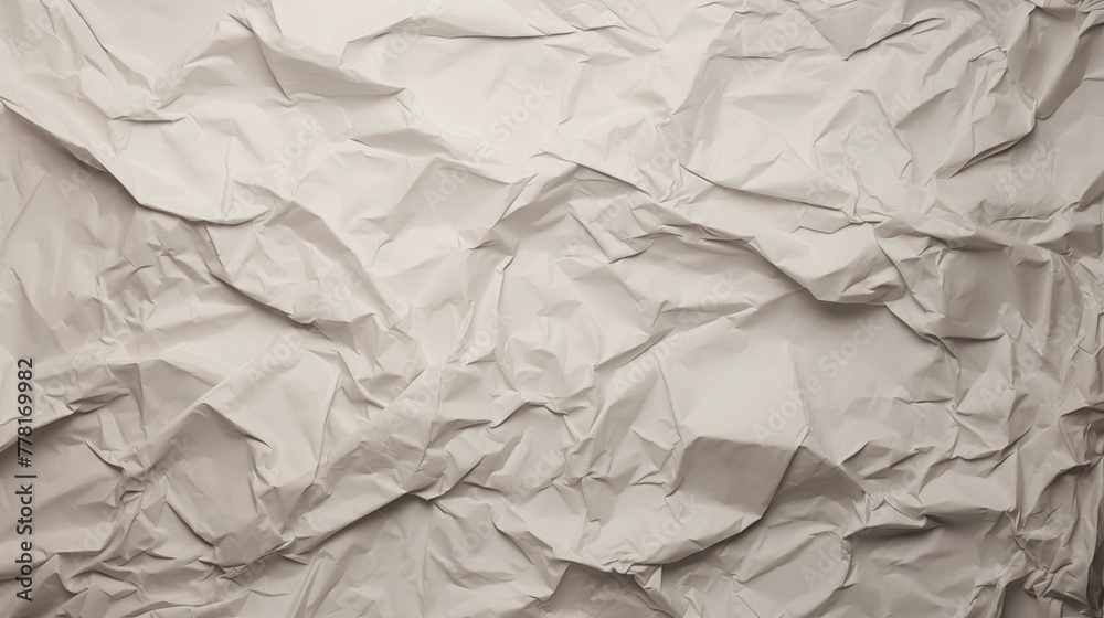 Obraz premium White crumpled paper, top view, background. Texture of heavily crumpled paper