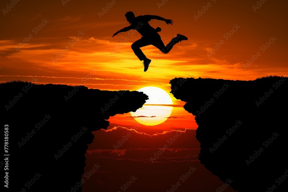 Man Jumping Off Cliff Into Ocean at Sunset Man Jumping Off Cliff Into Ocean at Sunset