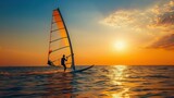silhouette of a windsurfer standing on a board against a sunset background.AI generated image