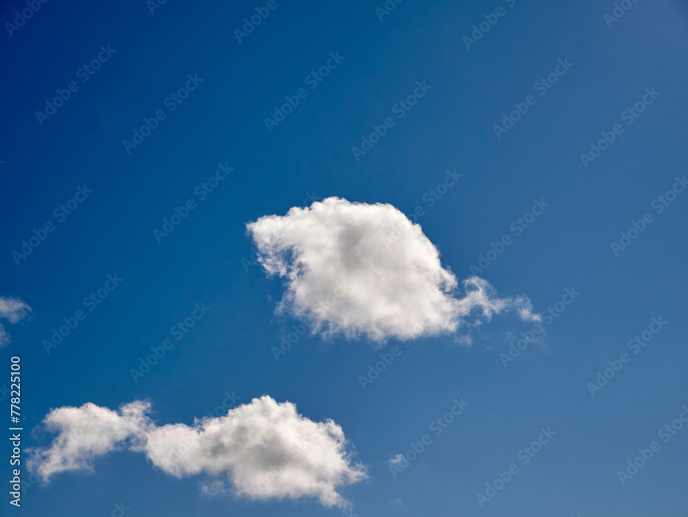 Cumulus clouds in the sky. Fluffy cloud shapes