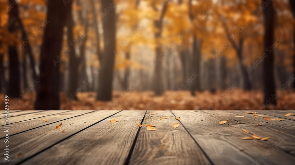 Wooden platform with a blurred autumn backdrop.
