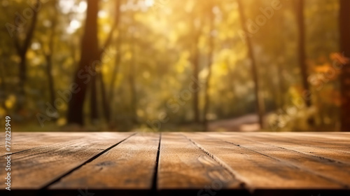 Wooden platform with a blurred autumn backdrop. 