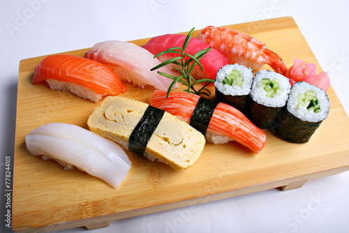 Tsuki (Regular) Imported Tuna, Salmon, sea bream, cuttle fish, shrimp and egg omelette and California roll  photo