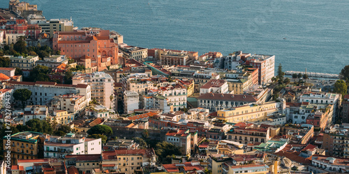 Naples, Italy. Top View Cityscape Skyline Of House In Residential Area And Part Of Gulf Of Naples In Sunny Day.