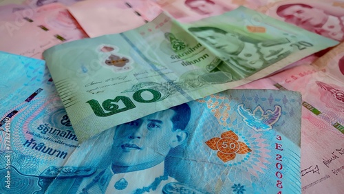 Konstfotografi Close-up of a pile of twenty baht, fifty baht, one hundred, five hundred and one thousand Thai baht (THB) notes of Thailand