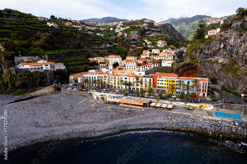Fototapeta Naklejka Na Ścianę i Meble -  Ponta do Sol in Madeira Island, Portugal. Aerial drone view at cityscape of coastal town and beach