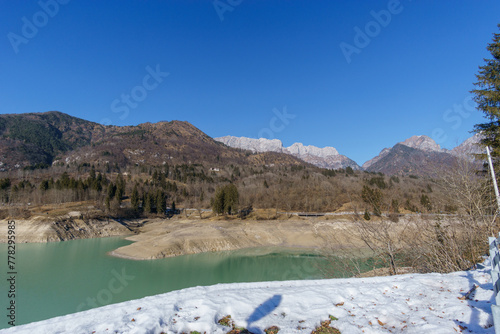 Reservoir lake during winter time in the mountain landscape of the Alps, Barcis, Friuli-Venezia Giulia, Italy photo