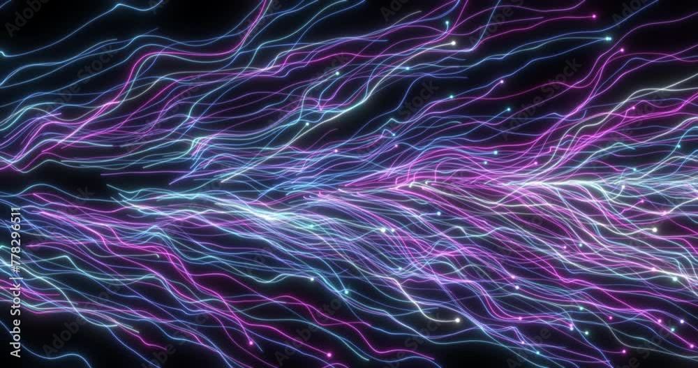 Particles that fly from left to right and leave colored sinuous trails. Fiber. Abstract animation.