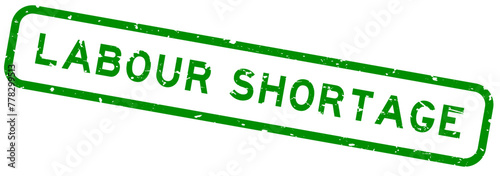 Grunge green labour shortage word square rubber seal stamp on white background