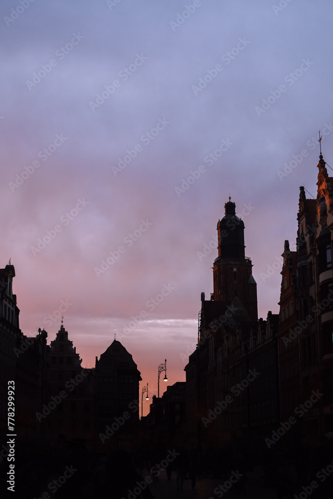 Silhouettes of Wroclaw, Poland. Historical market square and a magical pink sunset. Silhouettes of Wroclaw, Poland. Historical market square and a magical pink sunset.
