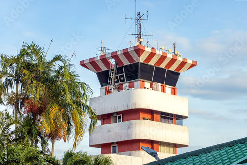 A control tower in a tropical country