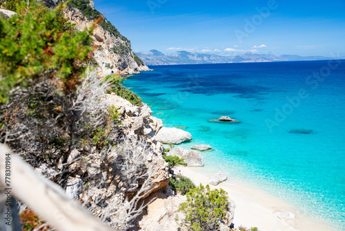 Fototapeta Naklejka Na Ścianę i Meble -  Cala Goloritzé, an azure beach located in the town of Baunei, in the southern part of the Gulf of Orosei, in the Ogliastra region of Sardinia.
