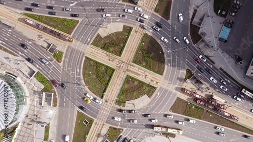 Traffic at a roundabout in a city, aerial circular