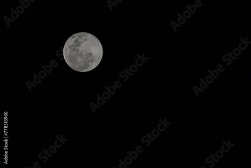 Close up full moon on the Black sky © pumppump