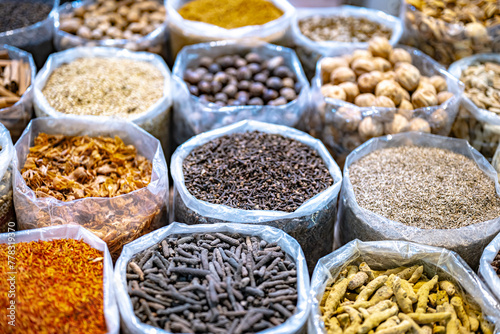 Variety of spices and herbs on Nizwa Souq, Oman © monticellllo