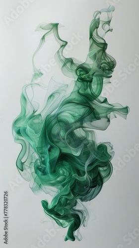 Green and blue ink in water on a white background ,Green ink in water. Ink in water ,Green smoke bomb exploding against white background