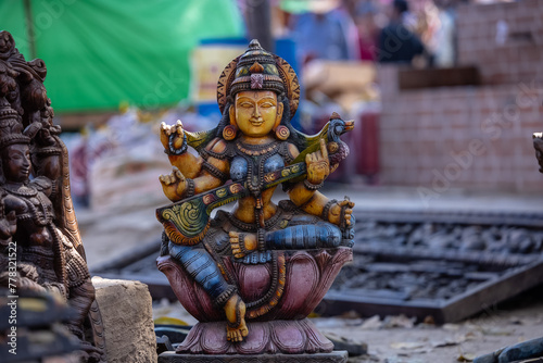 A handmade wooden idol of Goddess Krishna sounds like a beautiful Laxmi to the deity's revered presence in Hindu mythology and culture. 