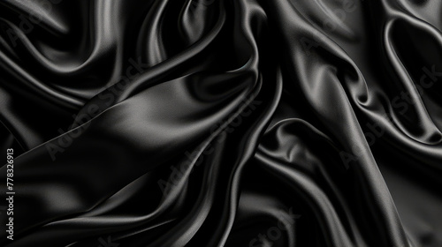 Luxurious black satin fabric with elegant drapes, suitable for fashion and interior design themes.