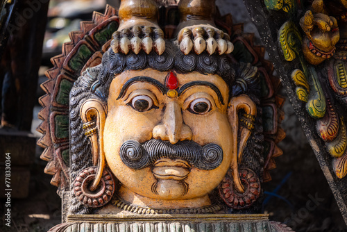 A handmade wooden idol of Hindu god sounds like a beautiful tribute to the deity's revered presence in Hindu mythology and culture.  photo