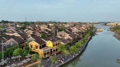 Drone footage of Hoi An ancient town with Thu Bon river, Quang Nam, Vietnam photo