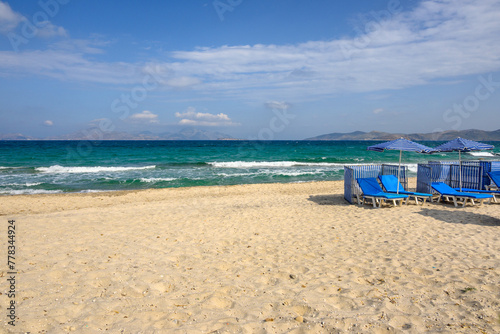 Beautiful Marmari beach with golden sand and emerald waters. Kos island, Greece