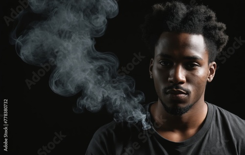 Mysterious Aura - Person Amidst Rising Smoke on Dark Background