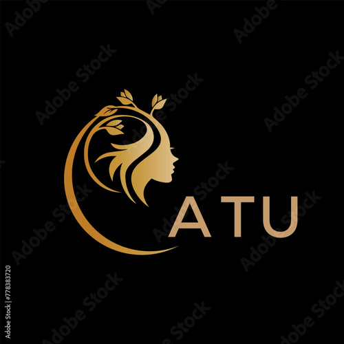 ATU letter logo. best beauty icon for parlor and saloon yellow image on black background. ATU Monogram logo design for entrepreneur and business.	
 photo