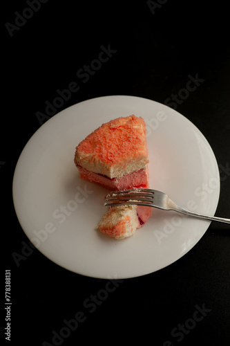 Cheese Cake with fork on a plate