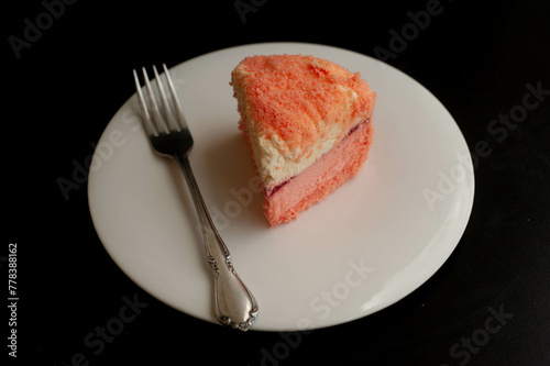 Cheese Cake with fork on a plate