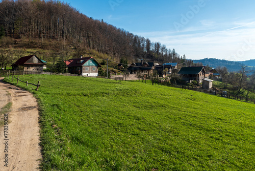 Small settlement with few wooden houses in mountains in Slovakia - Kycera settlement in Javorniky mountains