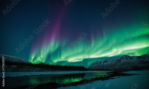Aurora borealis, northern lights over mountains in winter, Iceland © Andrey
